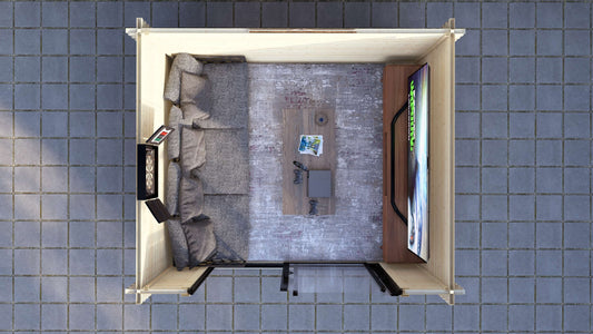 Foxglove 3.2×2.6m garden log cabin styled as a modern home office in UK garden. Top-down view of a living room with furniture on a tiled floor.